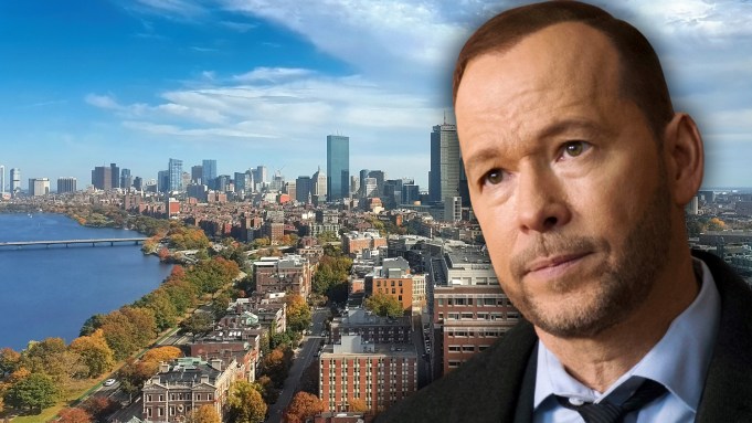 Donnie Wahlberg as Danny Reagan in Boston Blue with Boston skyline