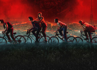 Stranger Things Finale Heads to Theaters in Unprecedented Netflix Move The Stranger Things cast riding bikes with a dramatic red sky backdrop, representing Season 5.