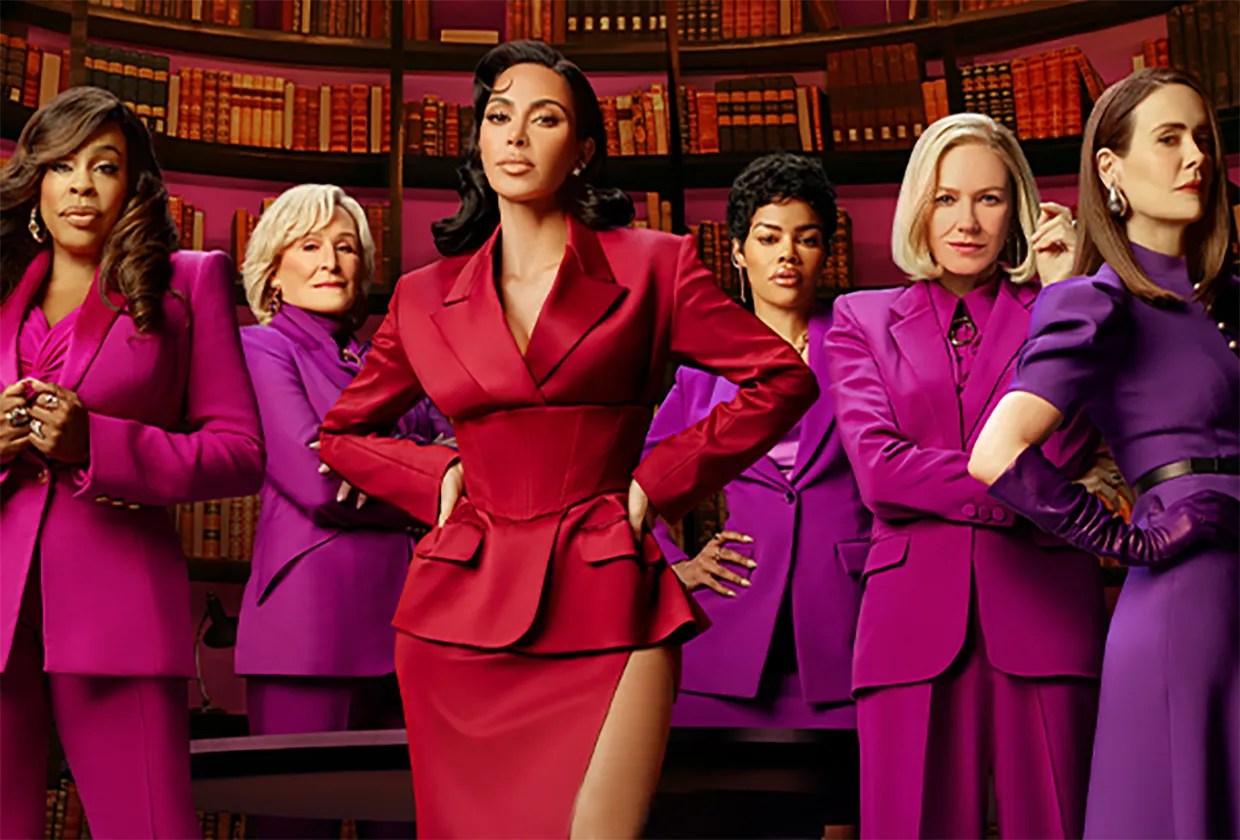 All's Fair cast featuring Kim Kardashian and ensemble in colorful suits in law library setting