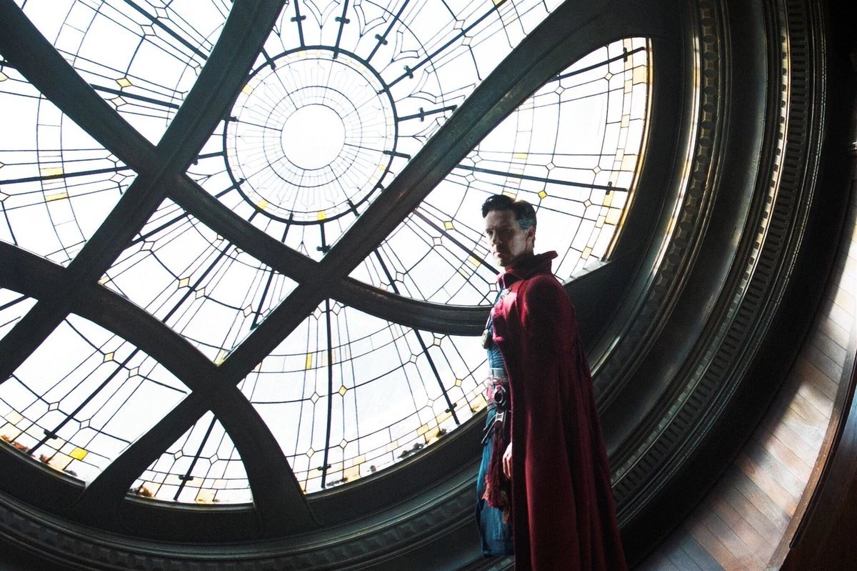Doctor Strange standing beneath the stained-glass dome of the New York Sanctum Sanctorum