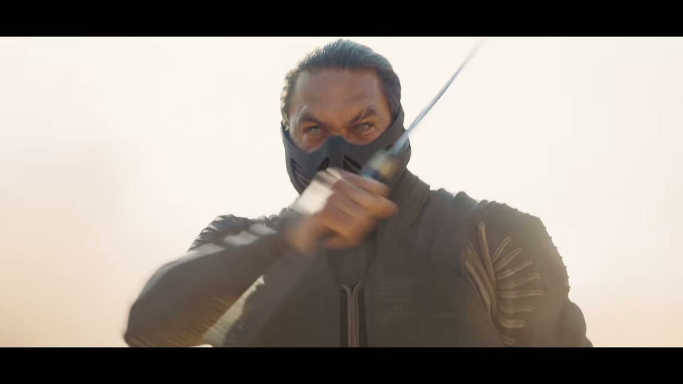 Jason Momoa raising a blade in the Dune: Part Three trailer