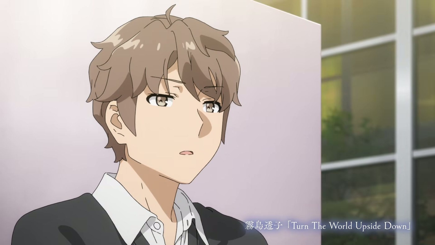 A character in a black jacket with an on-screen music credit