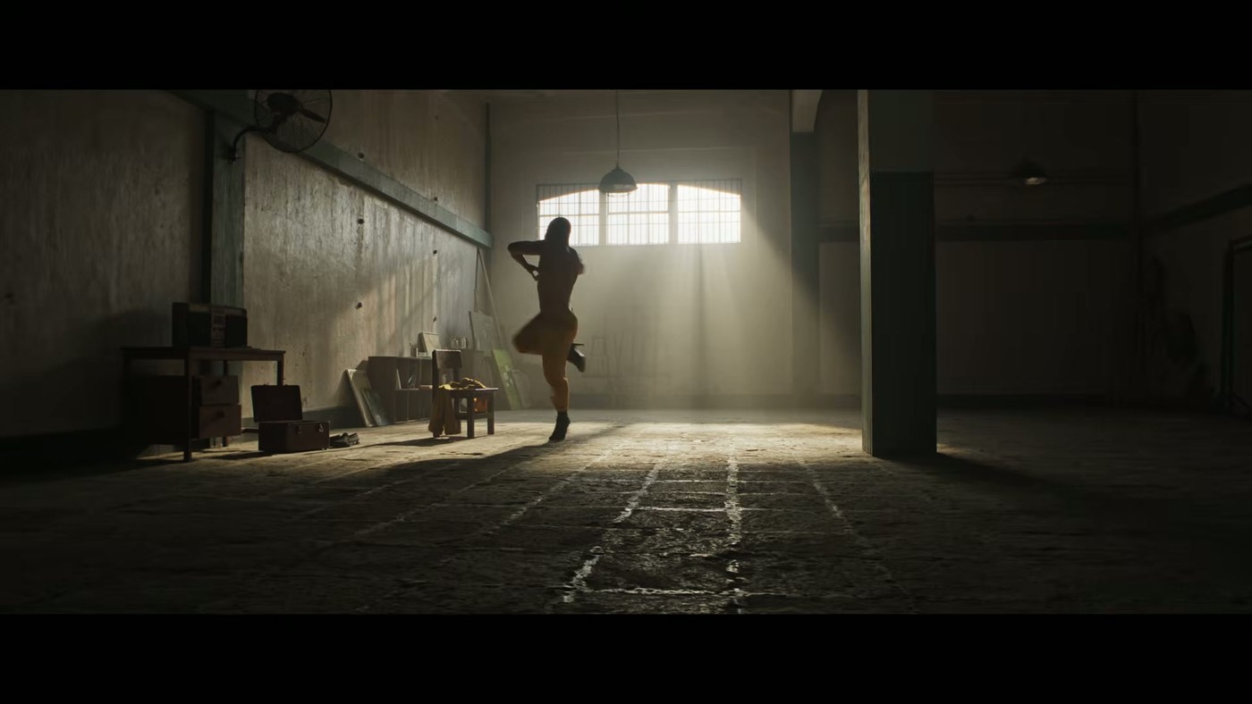 Silhouette in spotlighted doorway in Ghost in the Cell trailer