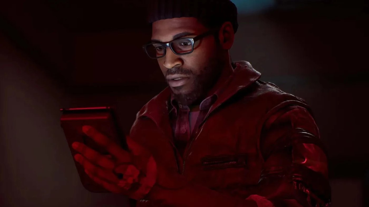 Simon Ordell, protagonist of Silent Hill: Townfall, in a dimly lit red-tinted room