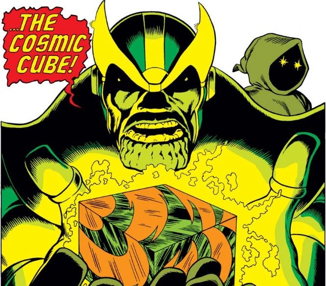 Thanos holding a glowing orange Cosmic Cube