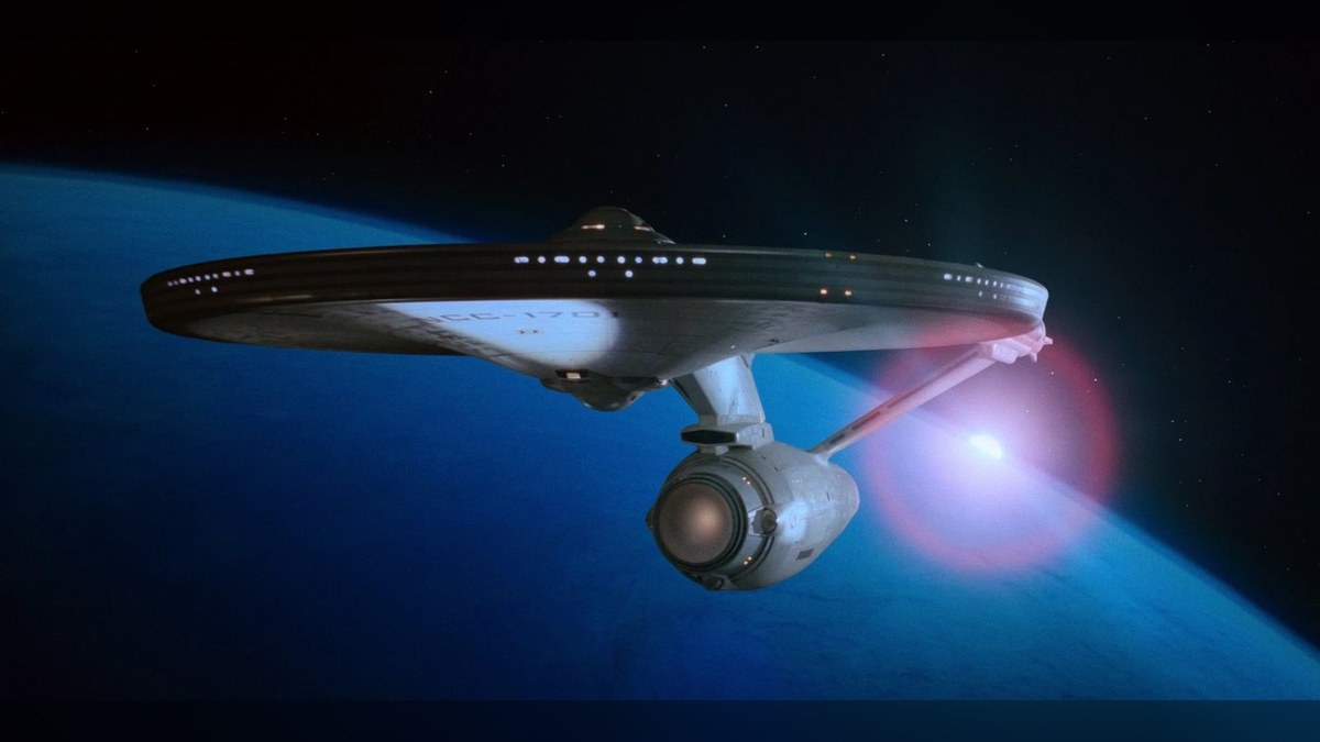 The USS Enterprise NCC-1701 in orbit above a planet