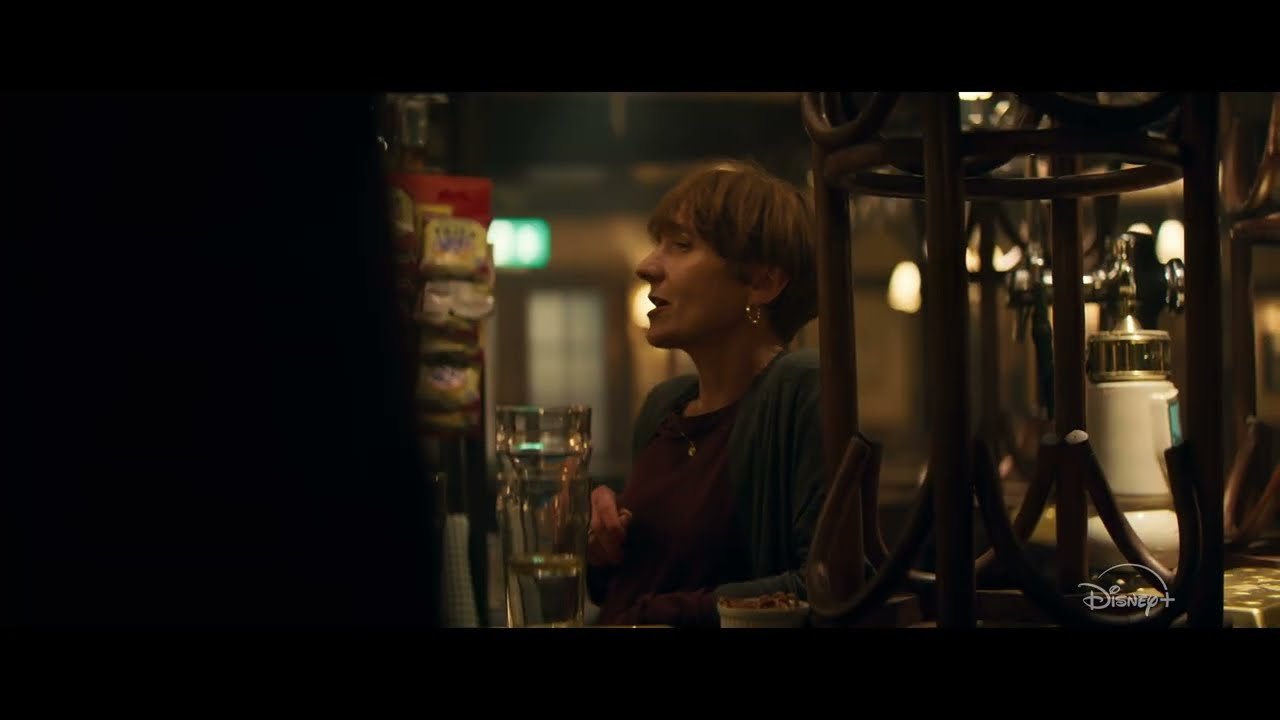 A dimly lit bar interior in the VisionQuest trailer