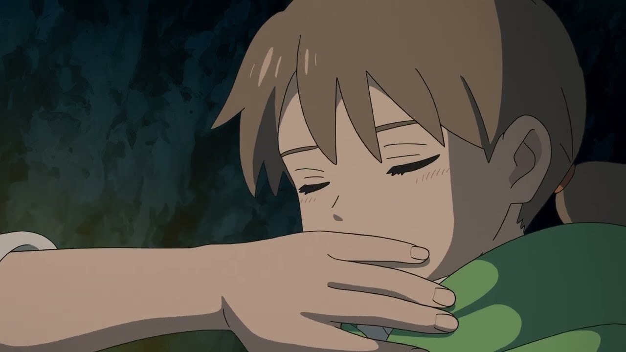 A hand clamped over a girl's mouth in the cocoon trailer