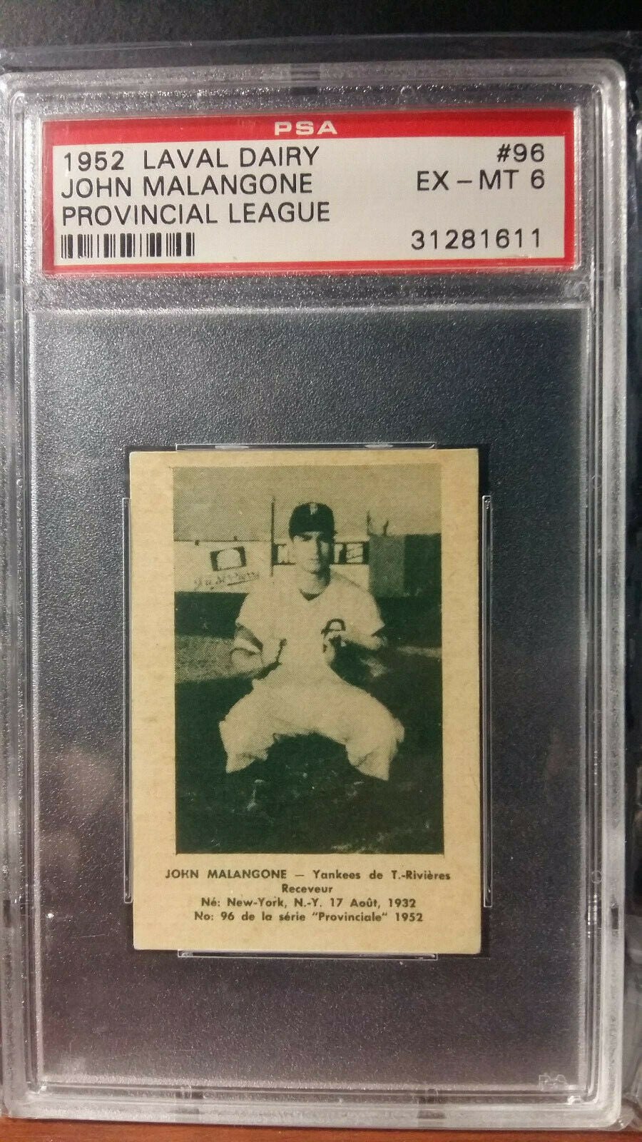 A PSA-graded and encapsulated 1952 baseball card in a hard plastic slab