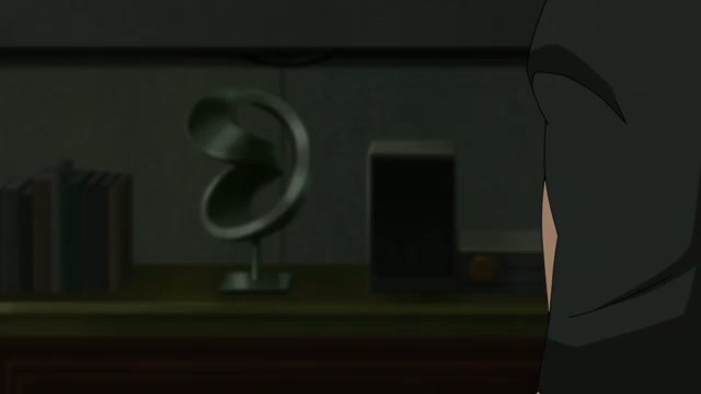 A retired Batman cowl sits in a glass display case in the Knightfall Part 2 trailer