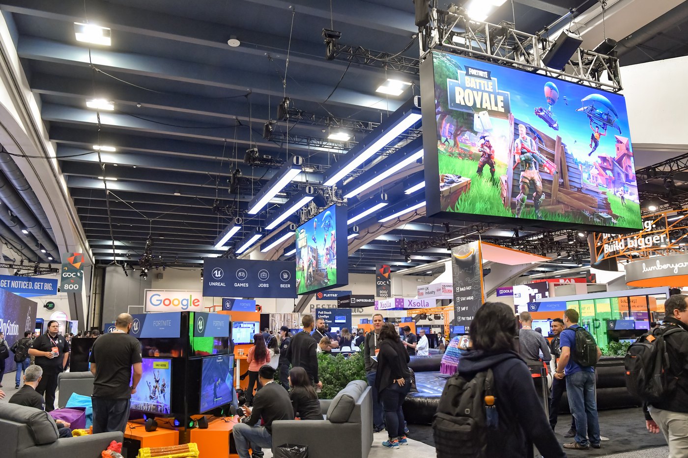 Fans playing Fortnite at a gaming expo