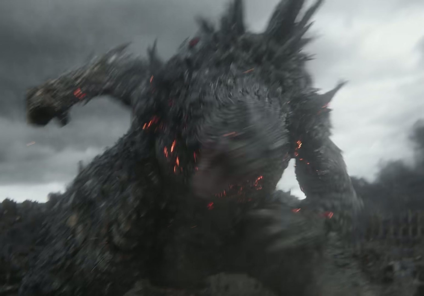 A scarred, regenerating Godzilla roars with glowing orange cracks across its body in the Godzilla Minus Zero trailer