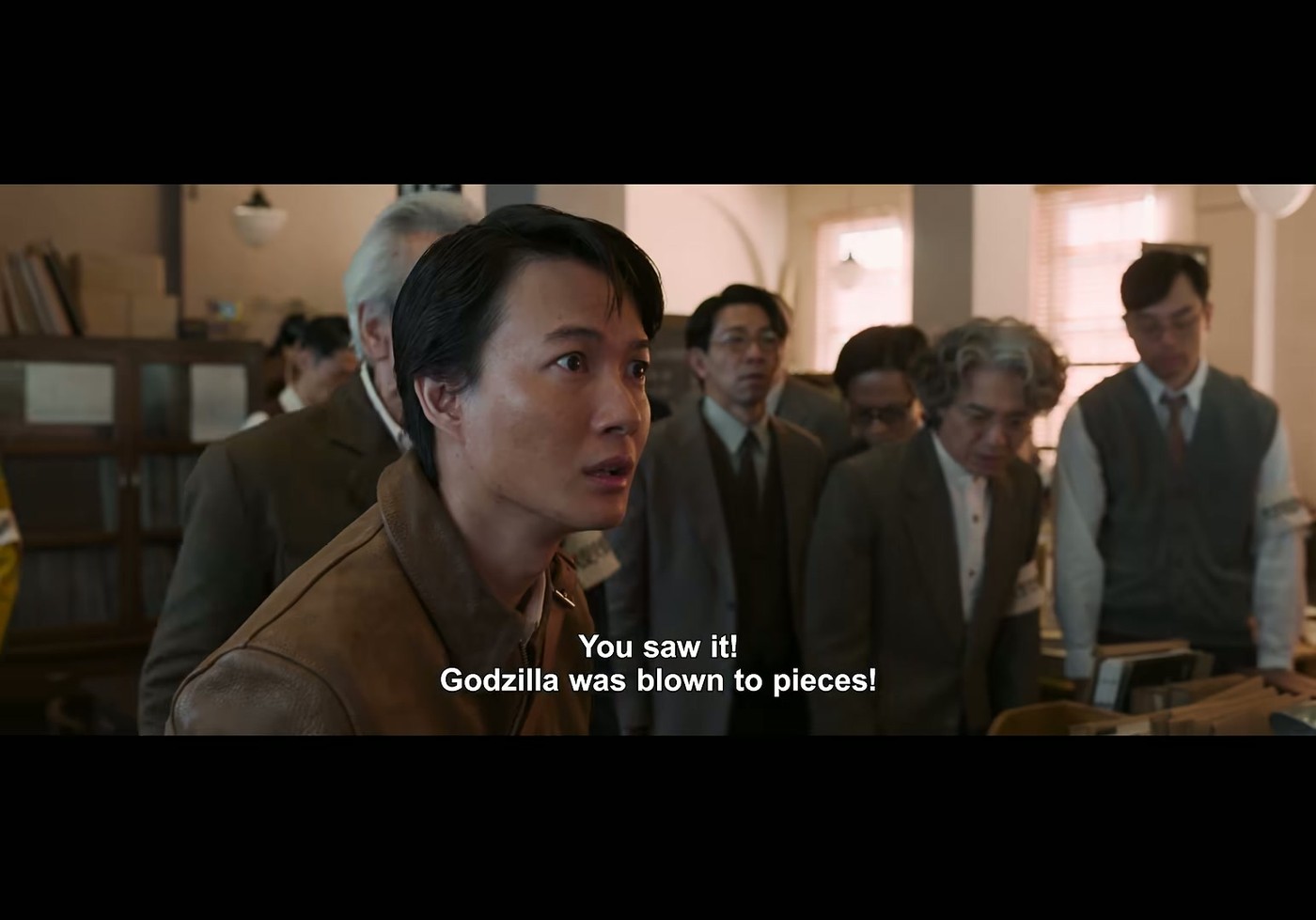 Koichi Shikishima, played by Ryunosuke Kamiki, reacts to news that Godzilla was destroyed in the Godzilla Minus Zero trailer