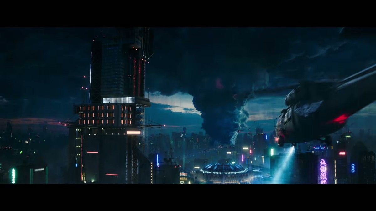 A neon futuristic cityscape with flying vehicles in the Street Fighter trailer