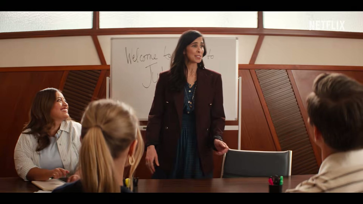 Joanne sitting in a full classroom during an Intro to Judaism class in Nobody Wants This Season 3