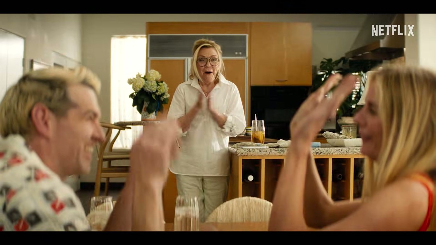 Characters raising their hands in surprise during a kitchen scene in Nobody Wants This Season 3