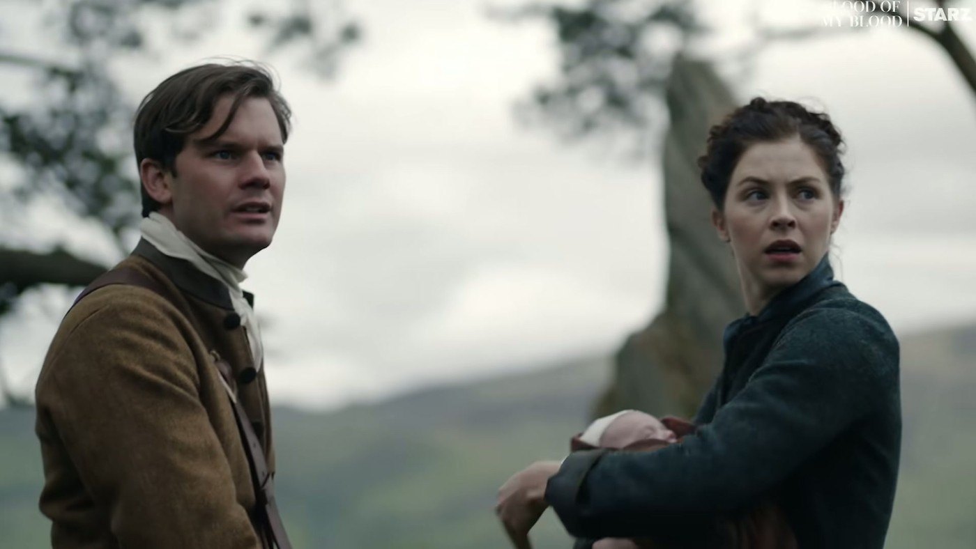Two characters walk together in the Outlander: Blood of My Blood season 2 trailer