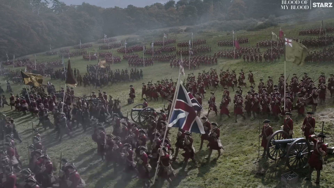 Soldiers march in a wide shot from the Outlander: Blood of My Blood season 2 trailer