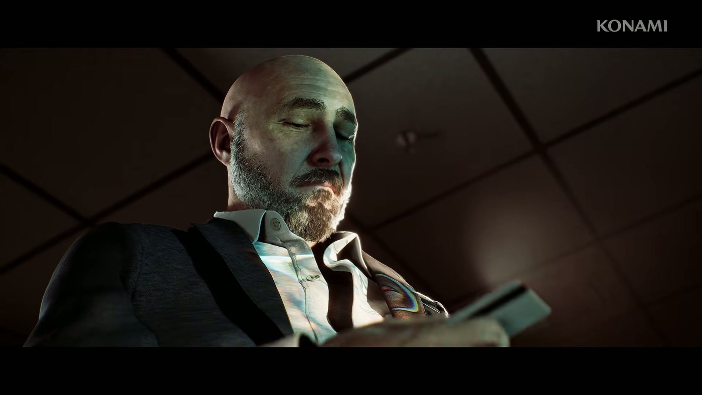 Unidentified man in a suit checking his phone in Silent Hill Townfall