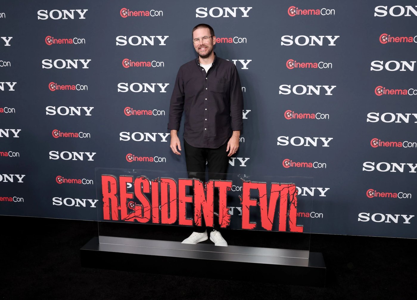 Director Zach Cregger presenting Resident Evil at Sony's CinemaCon panel