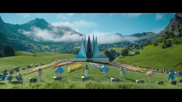 A wide green mountain valley with tribute launch pedestals arranged in a line