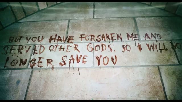 A message scrawled on a floor reading BUT YOU HAVE FORSAKEN ME AND SERVED OTHER GODS, SO I WILL NO LONGER SAVE YOU