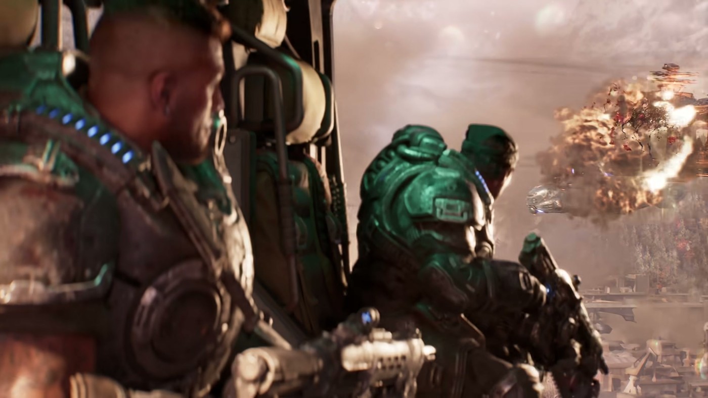 Three members of Bravo Squad lit by an explosion in the Gears of War: E-Day launch trailer.